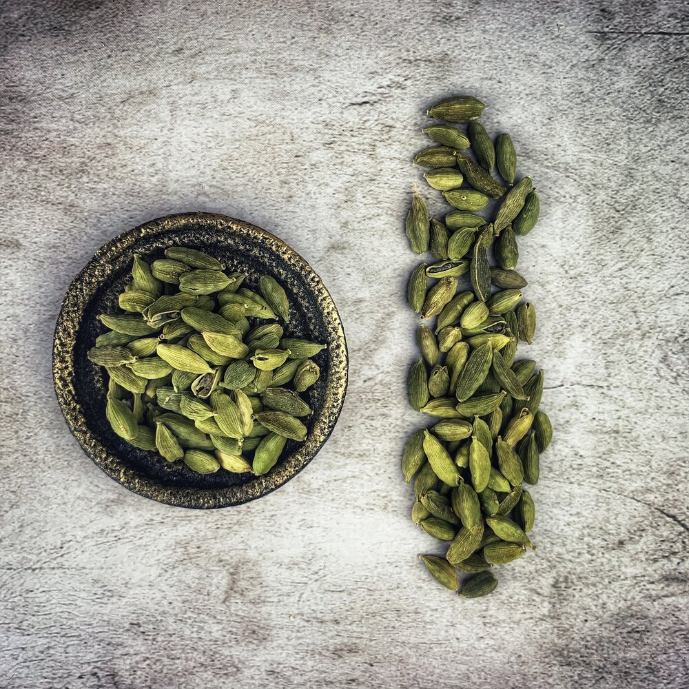 Organic cardamom pods for new love spells and warm attraction magic